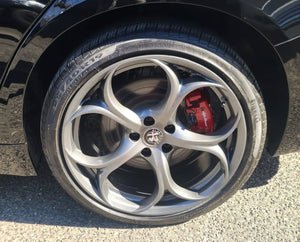 Alfa Romeo with wheels-off ceramic coating application by Wrap Mogul