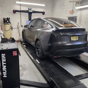 Tesla on Hunter alignment machine at Wrap Mogul New Jersey
